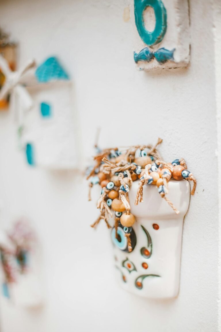 Artistic close-up of ceramic wall decor with vibrant beads creating a charming aesthetic.